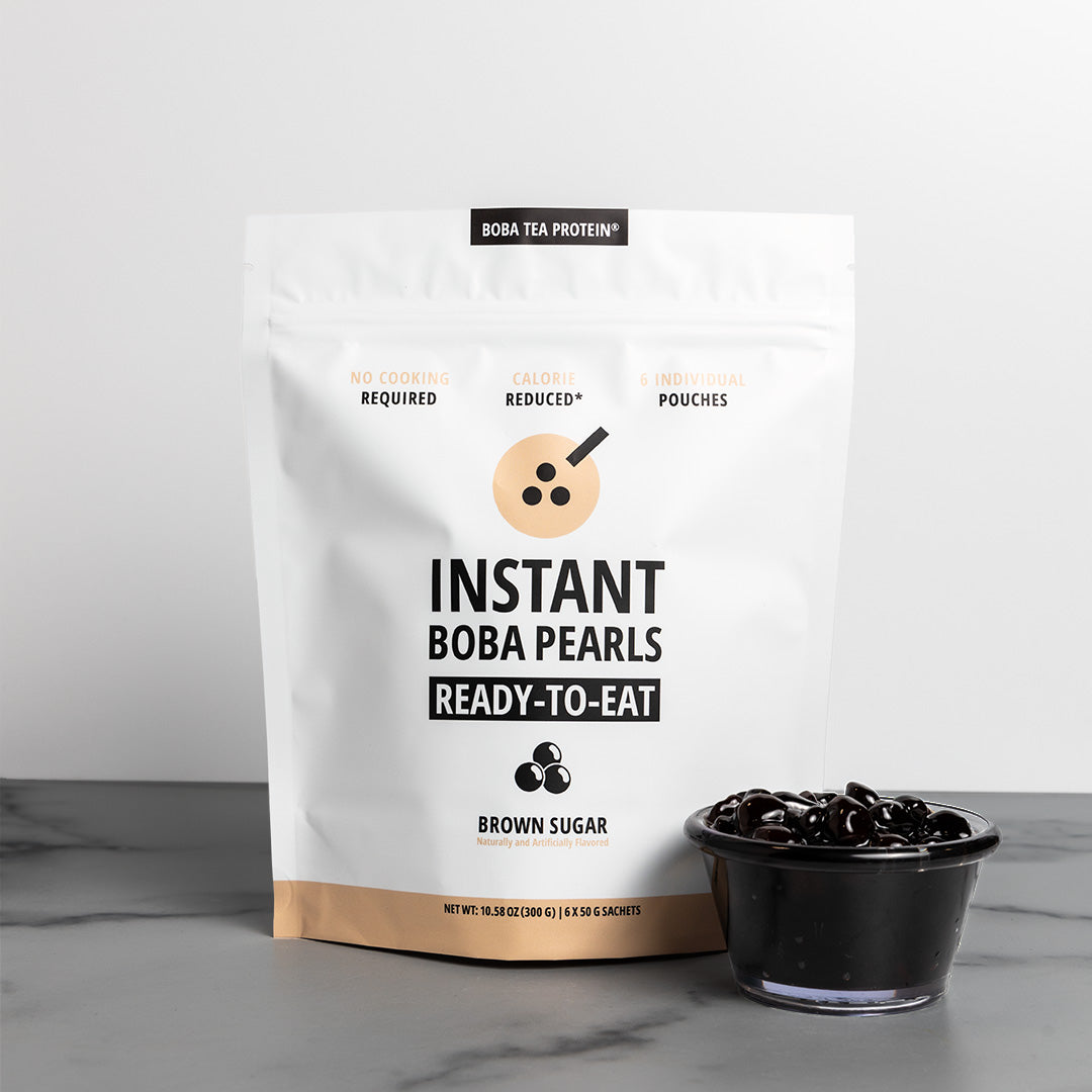 Bag of Instant Boba Pearls with a bowl of boba pearls on a marble surface