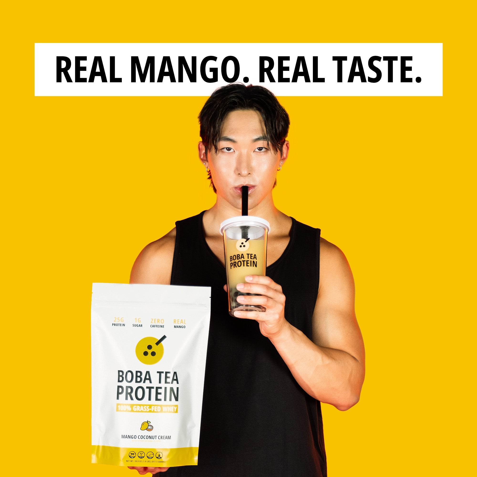 Person holding Boba Tea Protein packaging and a drink against a yellow background with text 'Real Mango, Real Taste'.