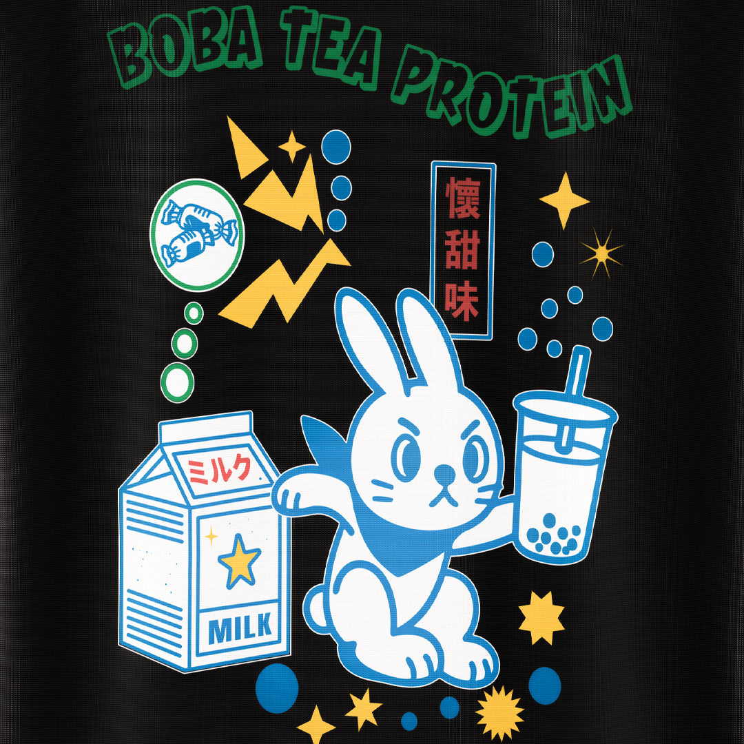Black t-shirt with a cartoon rabbit holding a boba drink and text on a colorful background