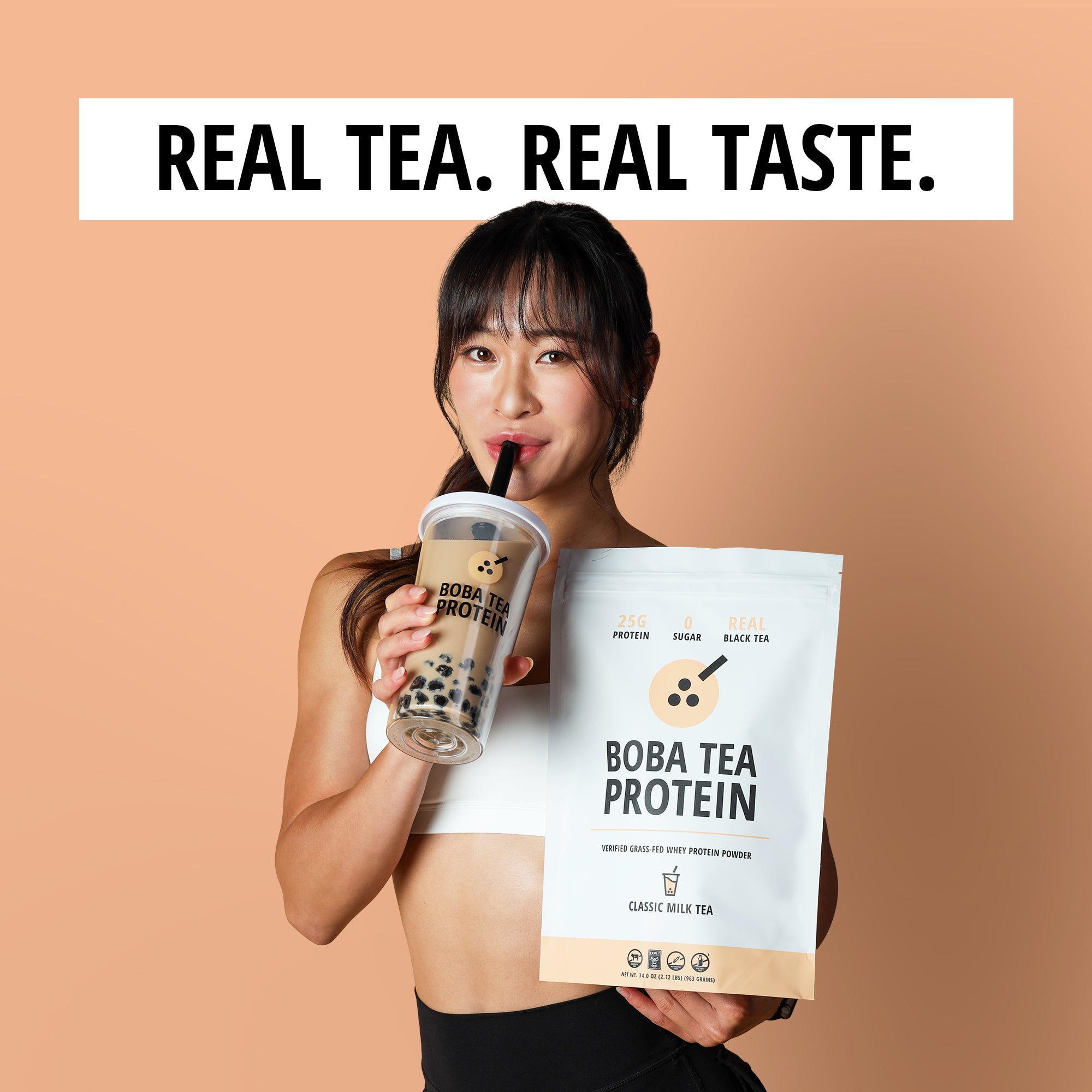Person holding a Boba Tea Protein package and a bubble tea against a beige background with 'Real Tea. Real Taste.' text.