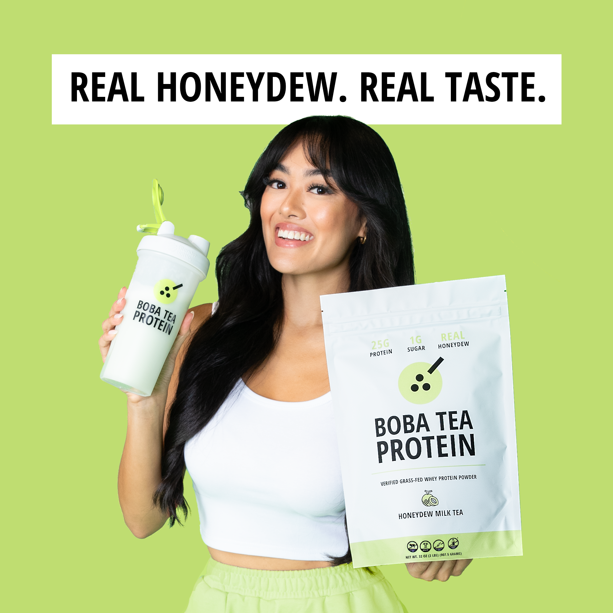 Woman holding Boba Tea Protein packaging and a white shaker on a green background