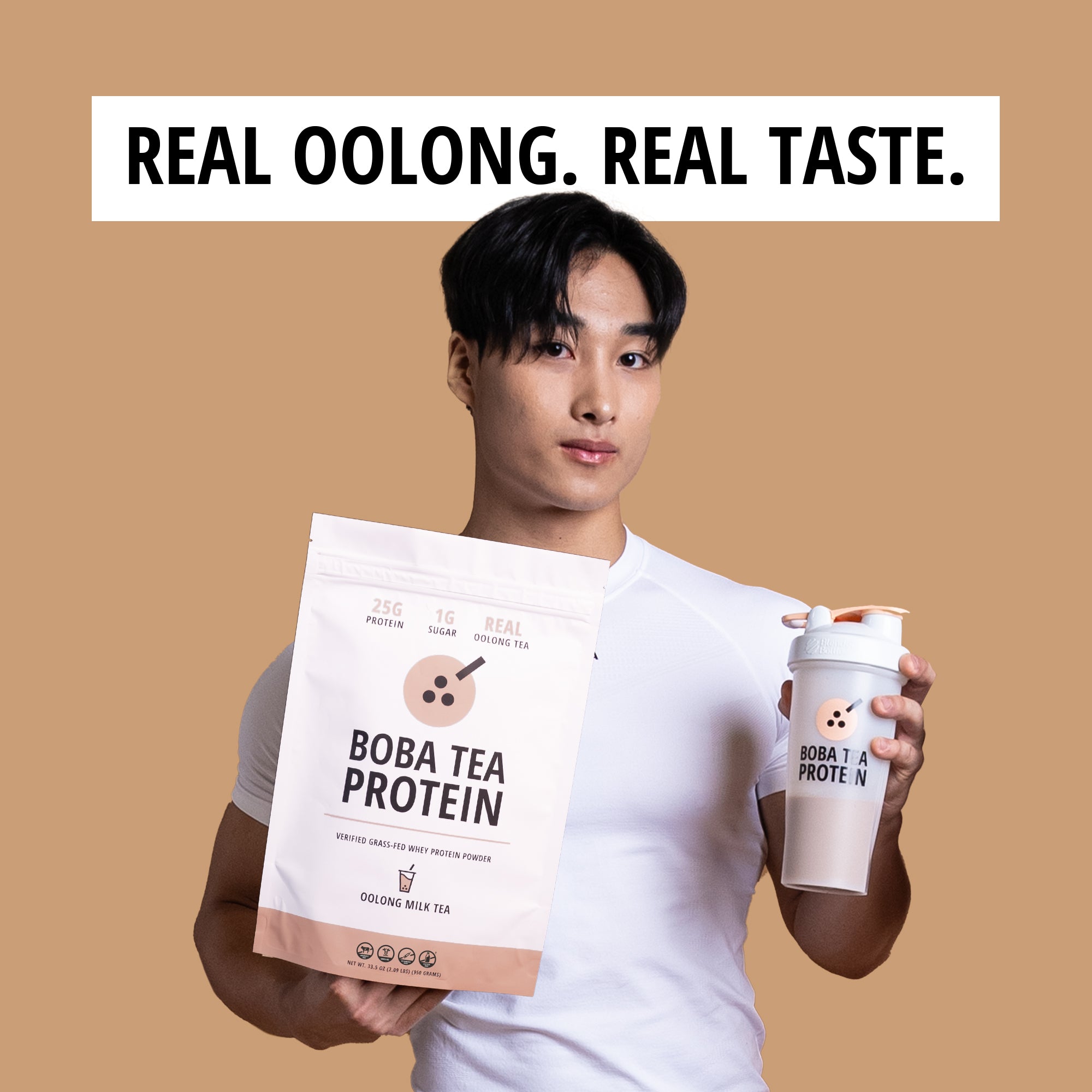 Person holding Boba Tea Protein packaging and a cup against a beige background with text 'Real Oolong. Real Taste.'